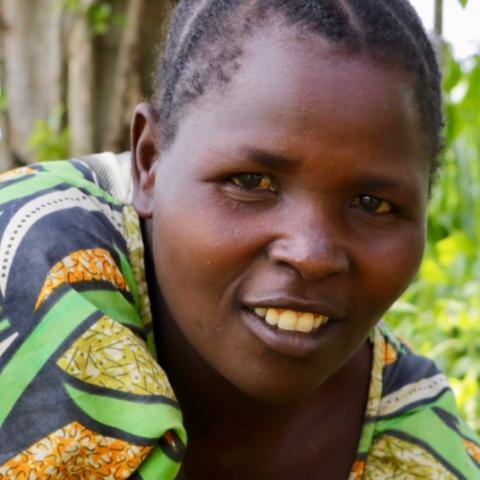 Close up photo of a person smiling at the camera